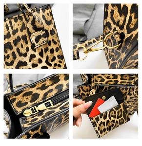 Detailed close-up of leopard print handbag golden hardware and matching mini coin purse