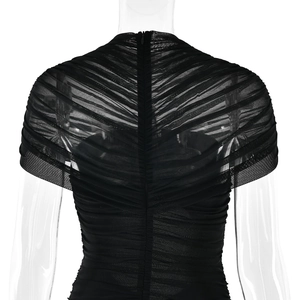Detail view of transparent black mesh back with pleated design and hidden zipper closure