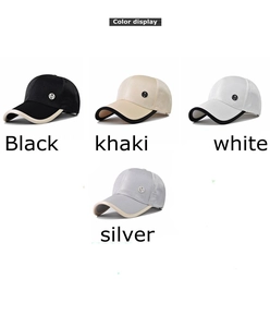 Color display of baseball caps in black, khaki, white and silver with metal logo detail