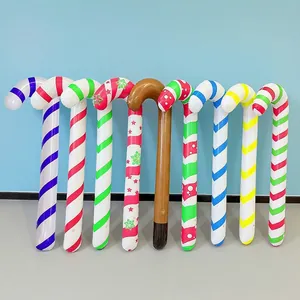Inflatable walker prop with festive candy cane stripes and wood grain patterns for holidays