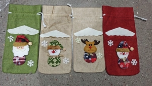 Detailed set of four Christmas burlap wine bottle covers with holiday character appliques