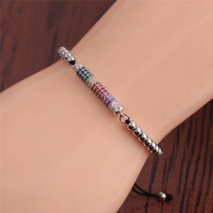 Adjustable woven bracelet with colorful cubic zirconia cylinder and silver beads