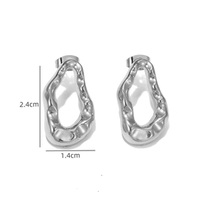 Detailed view of silver irregular liquid metal studs measuring 2.4cm by 1.4cm