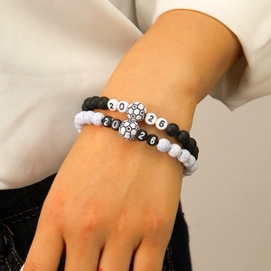 Detail view of 2026 soccer beaded bracelets set on wrist with adjustable fit