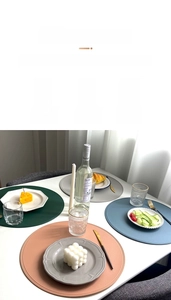 Close-up of 2mm thick double-layered round PVC place mat with heat-pressed edges