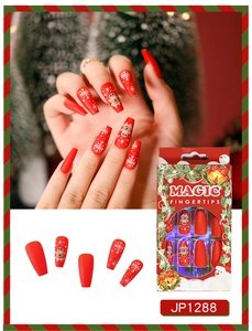 Christmas press-on nails featuring red gingerbread man and snowflake designs with packaging