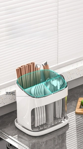 Internal view of kitchen utensil organizer with 4 slots for sorting spoons and forks