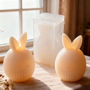 Detail of Easter faceless rabbit candle mold with vertical stripe texture and wax finish