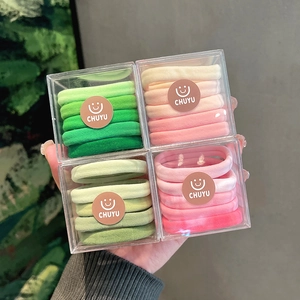 Colorful high elasticity hair ties set in clear gradient boxes with smiley face logo