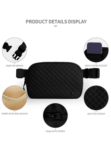 Detail view of black quilted nylon belt bag features buckles, zippers and mesh pockets