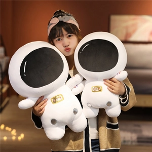 Creative astronaut plush toy shell being held by a model in a warm home setting