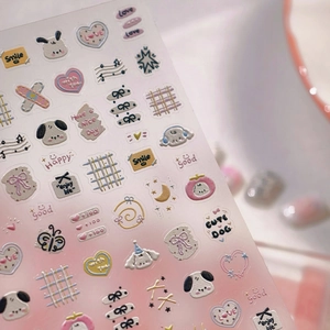 3D embossed cartoon puppy nail stickers with heart and bow patterns in macaron colors