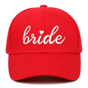 Red cotton bridal baseball cap with white bride embroidery and heart detail for wedding party