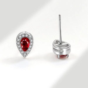 Elegant S925 silver pear-shaped red ruby stud earrings with halo of white zircons