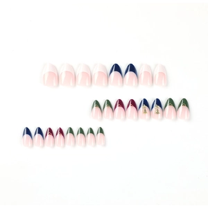Faux ongles amande en bleu marine et rouge avec accents dorés élégants de couronne