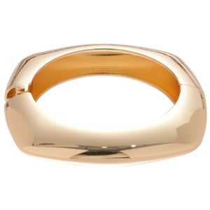 Polished gold wavy metal bangle with minimalist open hinge design for women