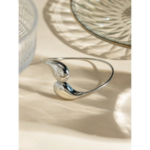 Polished silver stainless steel open bangle with unique double water drop design