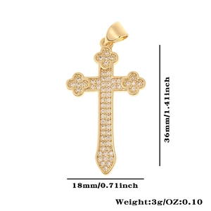 Detailed view of gold cross pendant with cubic zirconia inlay including size and weight specs