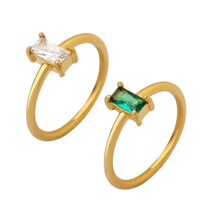French retro gold rings set with baguette-cut emerald green and white zircon stones