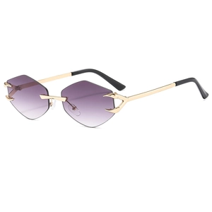 Frameless diamond-cut rimless sunglasses with purple gradient lenses and gold metal temples