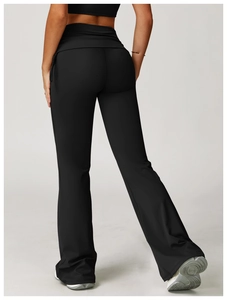 Rear view of high-waisted black yoga flare pants showing elastic butt-lifting fit