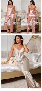 Detail of silk satin camisole and pants set in pink and champagne gold colors