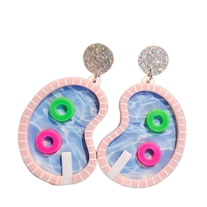 Chic acrylic swimming pool earrings with pink wavy borders and miniature swim rings