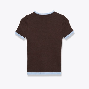 Close-up of brown ribbed knit sweater with blue contrast trim on neck and sleeves