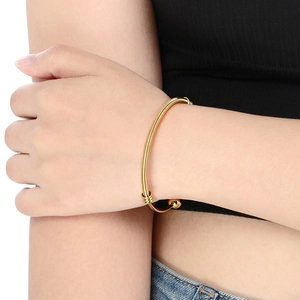 Minimalist 18K gold-plated stainless steel mesh cuff bracelet with spring texture for women