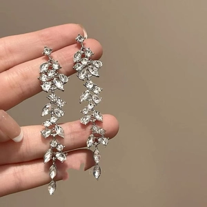 Elegant long tassel drop earrings with sparkling cubic zirconia crystals in silver