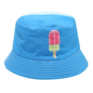 Detail of blue sun hat showing ice cream print and reinforced stitching on the brim