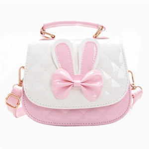 Pink and white quilted crossbody bag for girls with cute rabbit ears and bow detail