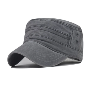 Detail view of washed cotton military flat cap with dual metal eyelets and stitching