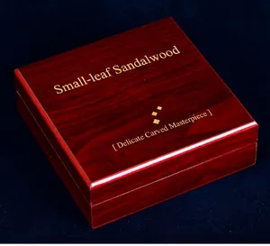 Premium red sandalwood gift box with high gloss finish and gold decorative font