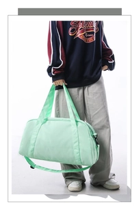 Large capacity mint green travel duffel bag for sports and fitness, detailed view