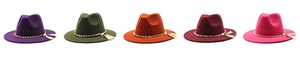 Detail of wool fedora hats with gold chains pearls and tassels in various colors