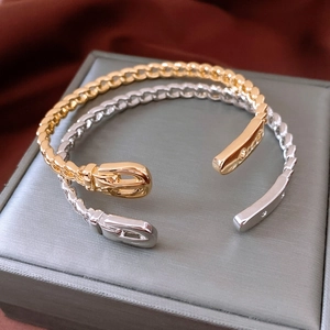 Close-up of 18K gold plated chain link bracelets with realistic buckle buckle detail