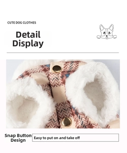 Detailed view of snap button closure and plush faux fur lining on plaid dog vest