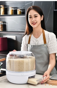 Rotating grain dispenser with compartments and drawer in a modern kitchen setting