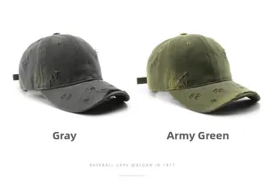 Distressed cotton baseball cap detail showing frayed brim in grey and army green colors