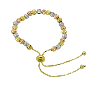 Detailed close-up of tricolor gold adjustable bracelet featuring textured metal beads