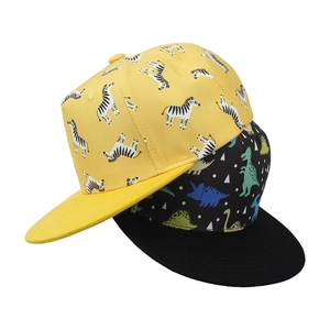 Kids snapback hats featuring colorful dinosaur and zebra patterns with flat brims