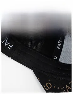 Detail of moisture-wicking sweatband inside a black baseball cap with FARD embroidery