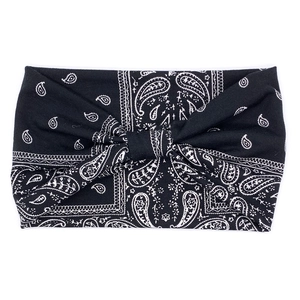 Detail of bohemian black and white paisley print on wide stretchy knotted cotton headband