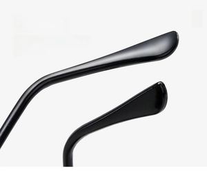 Detail of high-gloss black sunglass temples with ergonomic curved design for comfort