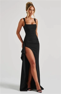 Detailed front view of high-slit black evening gown with square neck and slender straps