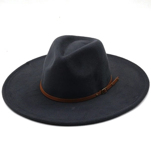 Detail of dark grey fedora hat with brown leather band, metallic buckle and rivets