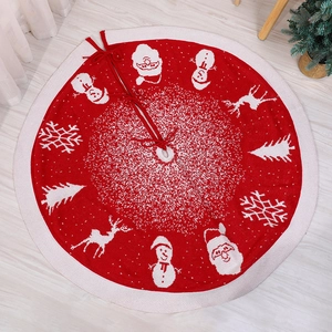 Classic red knitted Christmas tree skirt with white reindeer and snowman festive patterns