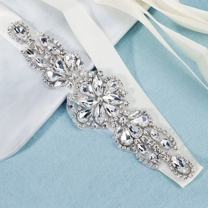 Sparkling bridal belt with silver rhinestone flower applique on elegant white ribbon