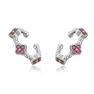 Detailed view of silver flower ear cuffs with pink and red zircon stones and clear reflections